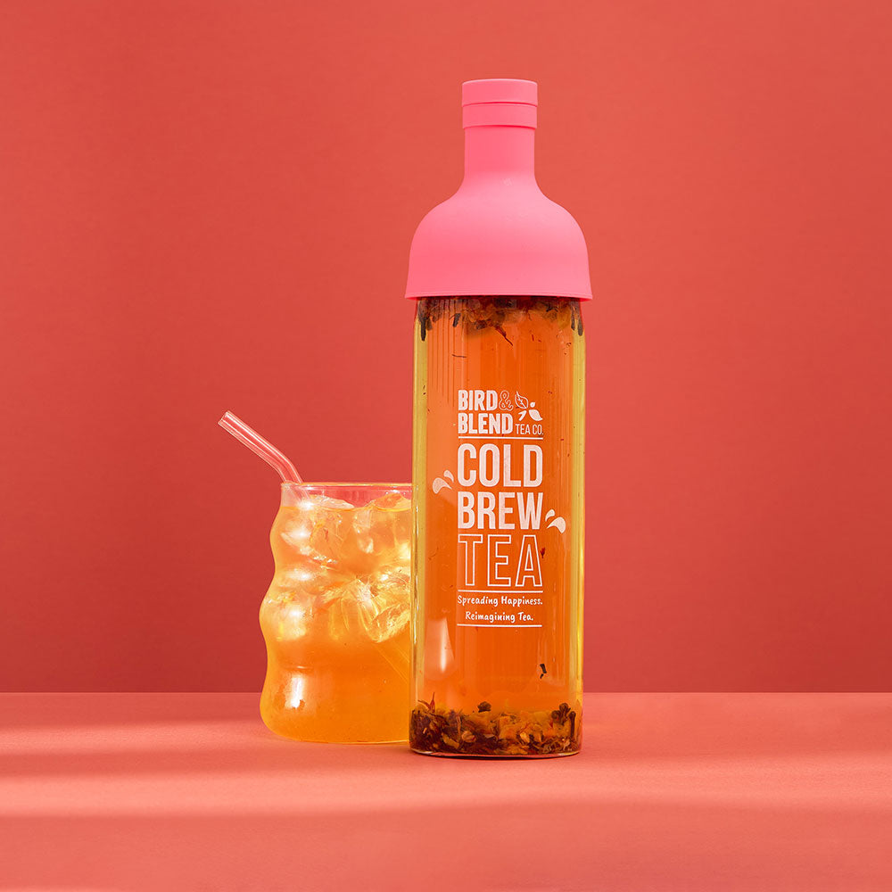 baby spice peachy pink cold brew tea bottle filled with tea & iced tea