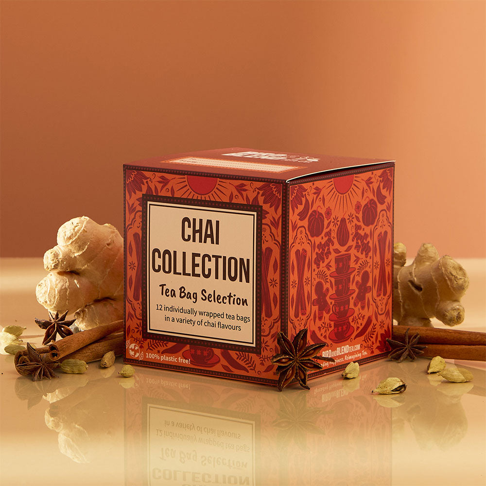 chai tea bag gift cube selection with chai ingredients around it