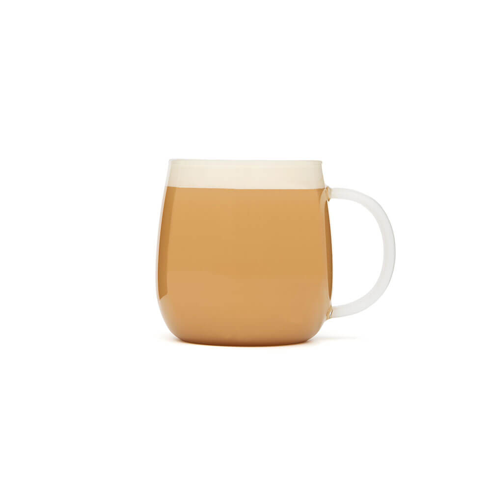 glass tea infuser mug with tea latte in