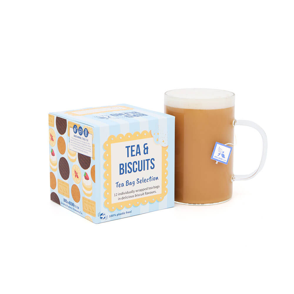 tea & biscuit tea bag selection gift cube & hot gingernut tea latte in mug