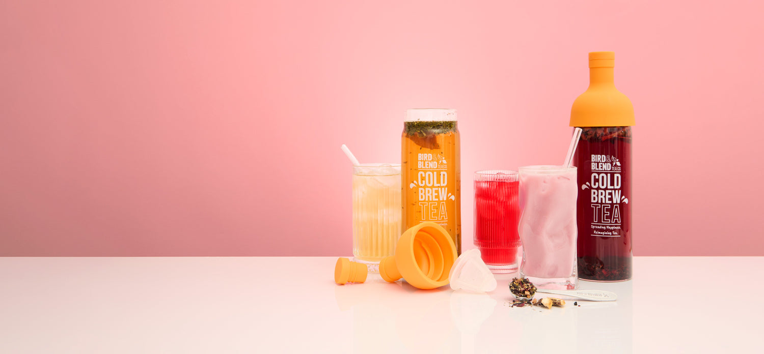 Cold brew tea bottles filled with tea and tea brewed in lemonade water and milk