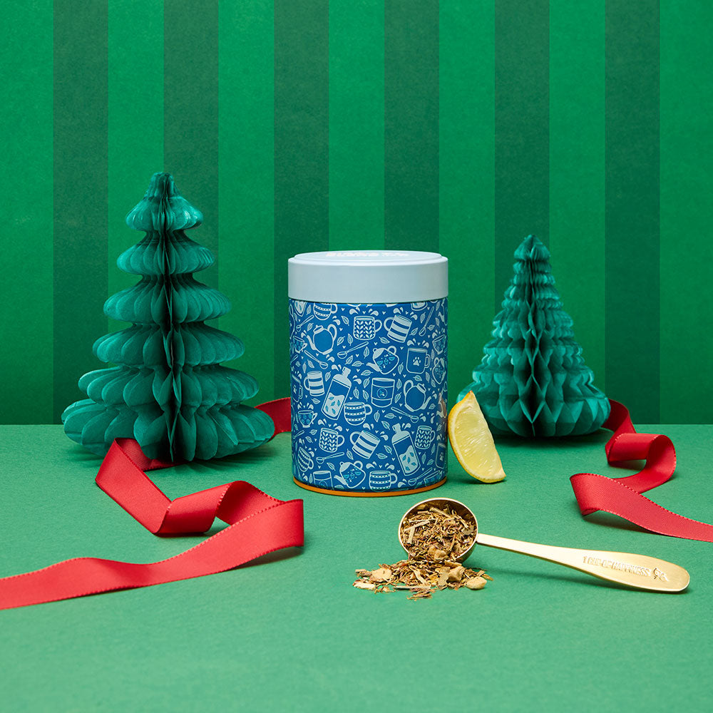 branded tea tin caddy and spoon filled with limoncello