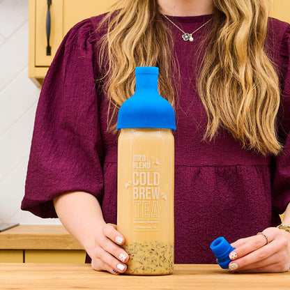 chocolate digestives tea in a blue cold brew bottle