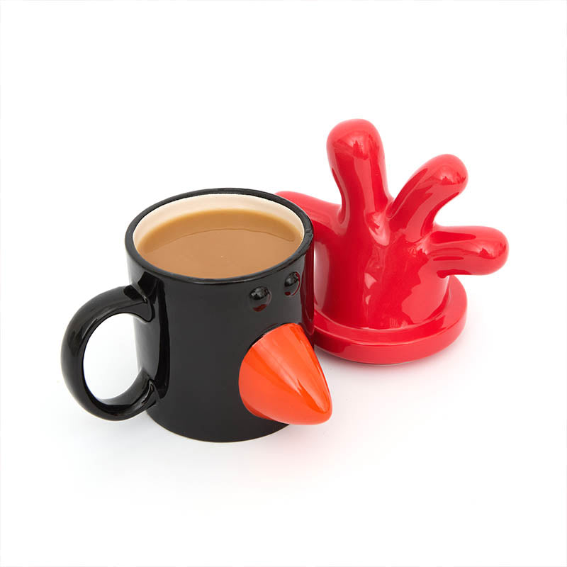 feathers mug filled with tea