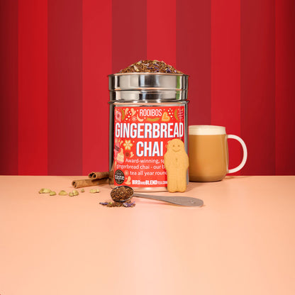 gingerbread chai tea wall tin and hot tea latte and spoon filled with loose leaf tea