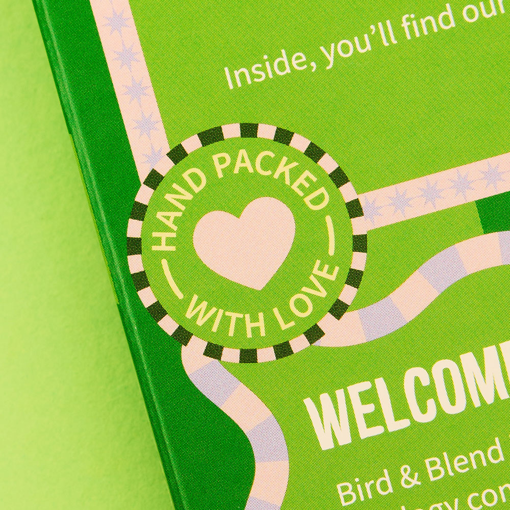 matcha advent calendar hype close up on image on hand pinked with love roundel on the back of matcha advent calendar
