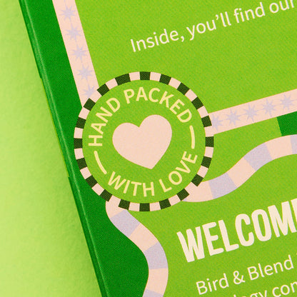 matcha advent calendar hype close up on image on hand pinked with love roundel on the back of matcha advent calendar