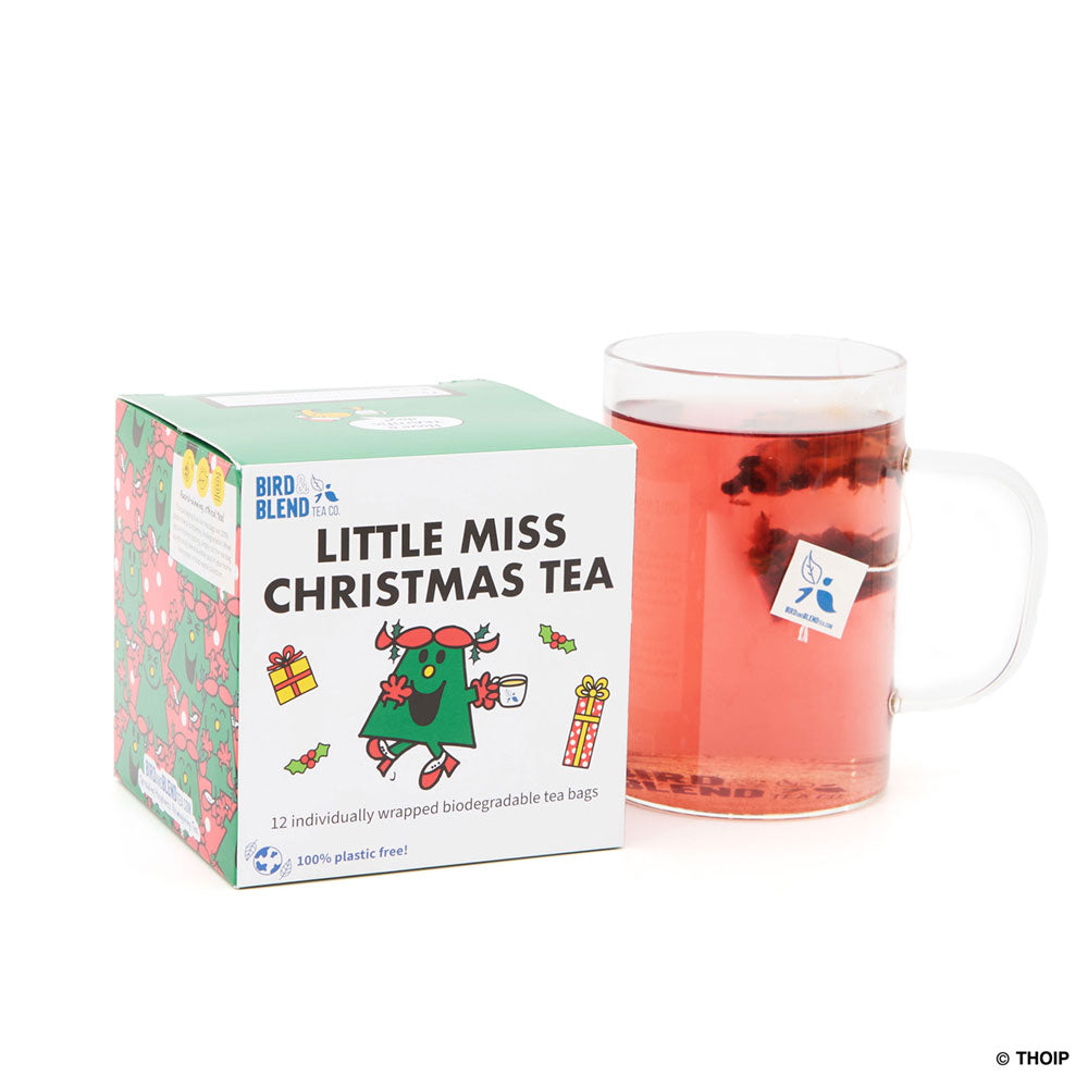 little miss christmas cube wth hot tea