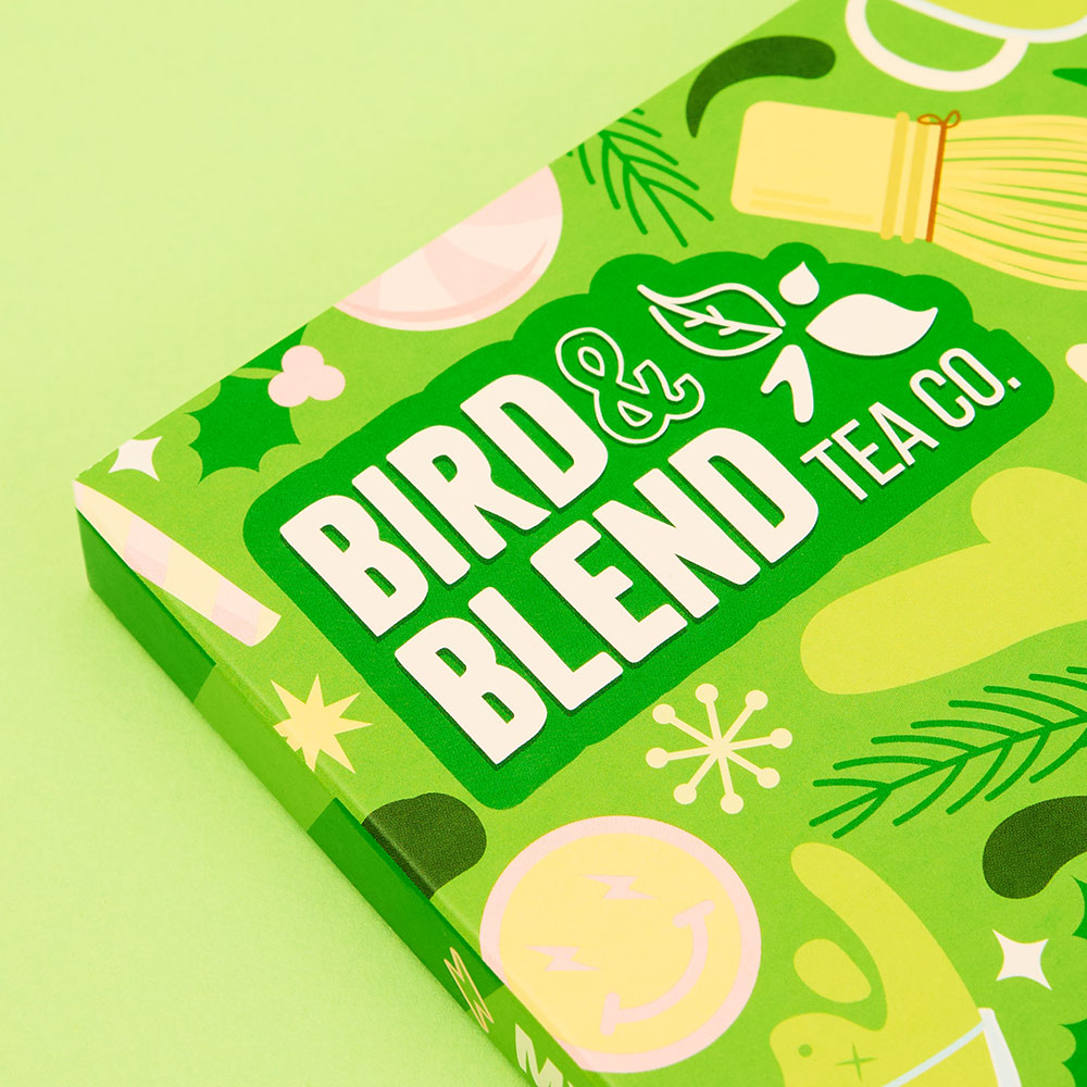 matcha advent calendar hype close up on image on bird and blend tea co logo &amp; bamboo matcha whisk