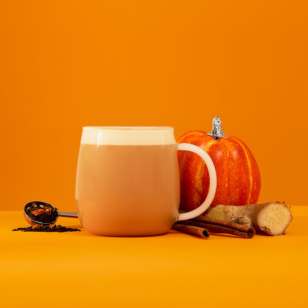 spiced pumpkin chai latte &amp; pumpkin ginger &amp; cinnamon &amp; spoon filled with loose leaf tea